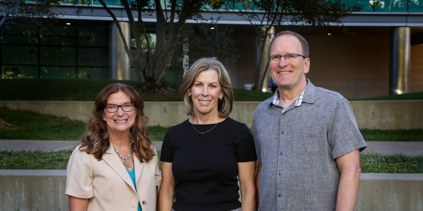 Three researchers (Jennifer Richer, Rebecca Schweppe, Bryan Haugen) pose for a portrait.