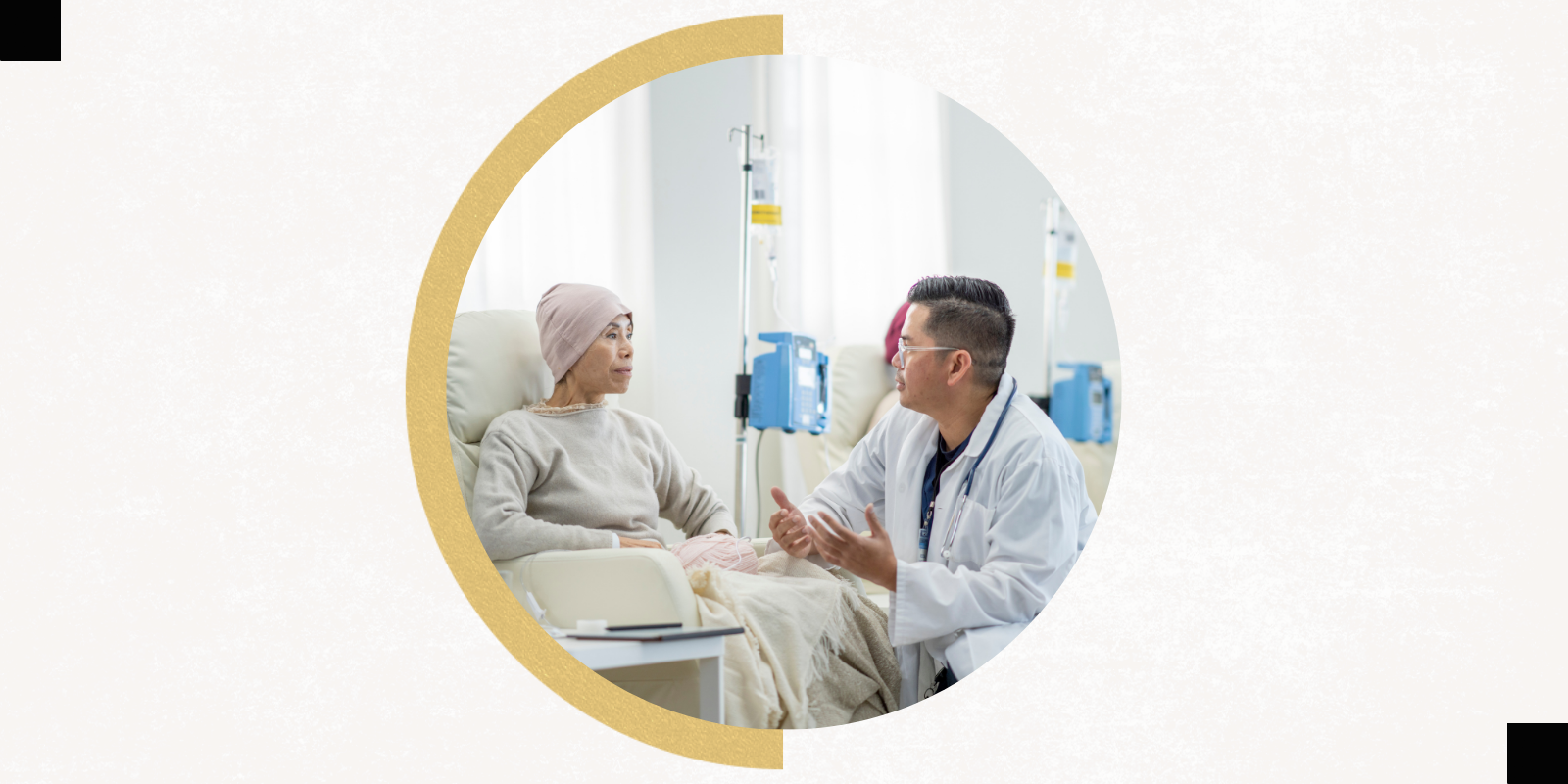 A male physician speaks to a female adult cancer patient as she receives chemotherapy treatment.
