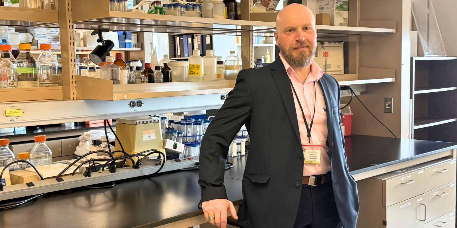 Sergejs Berdnikovs, PhD, stands in his lab at CU Anschutz.