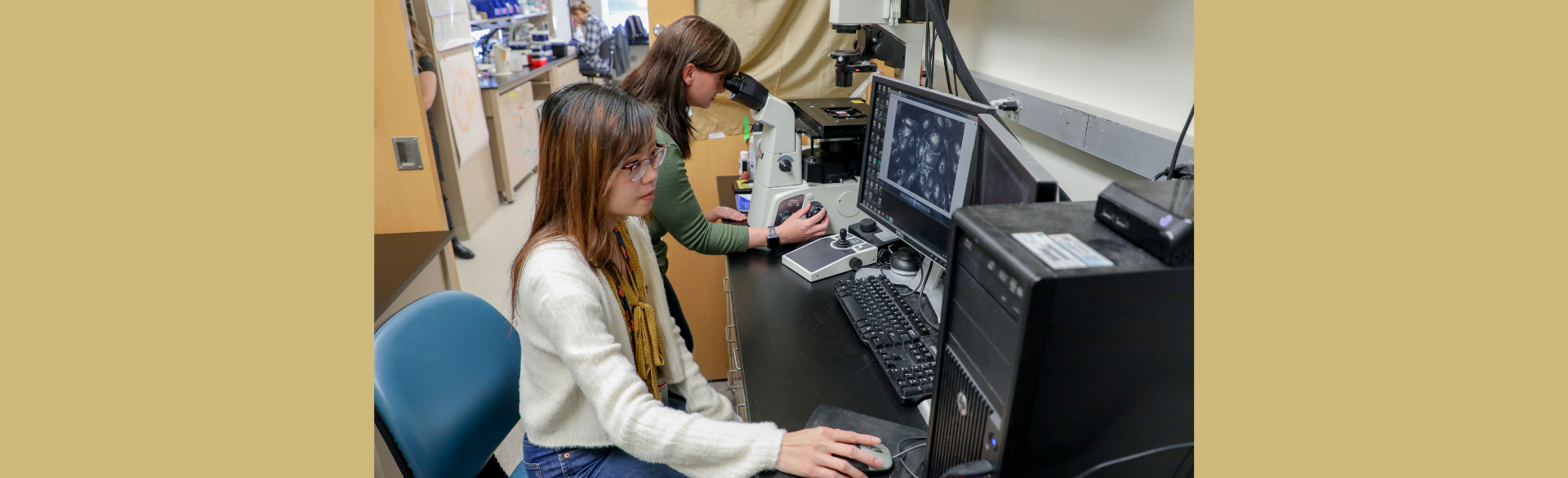 Two researchers working in a lab. 