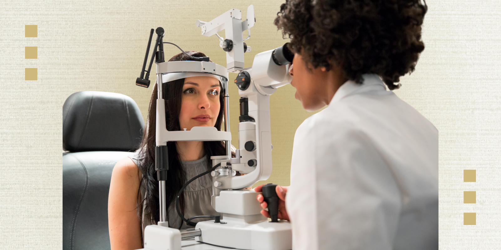 An eye specialist performs an eye exam on a patient.