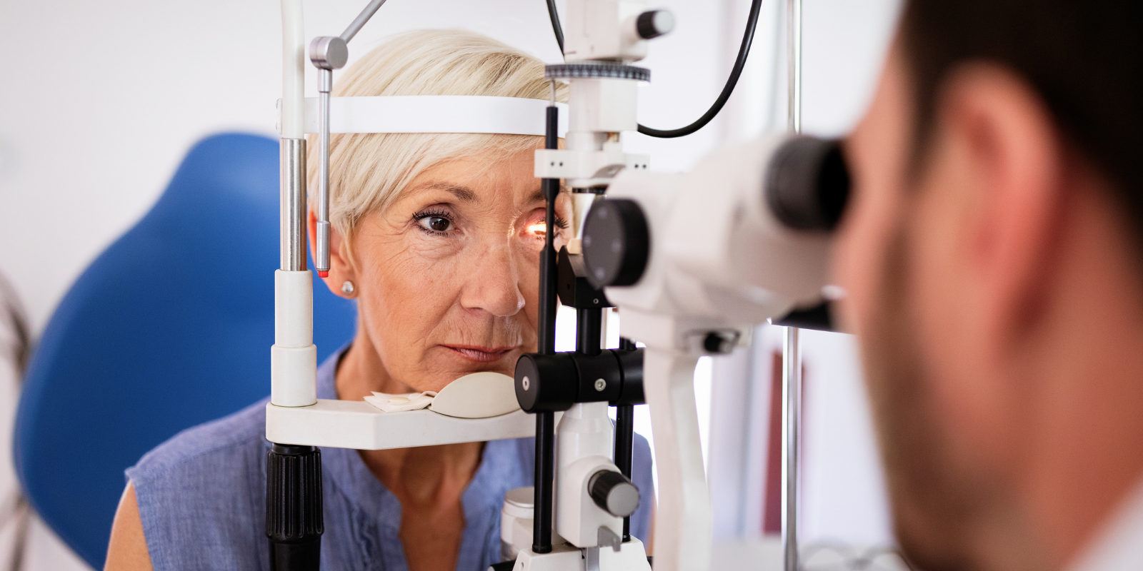 A woman gets an eye exam.