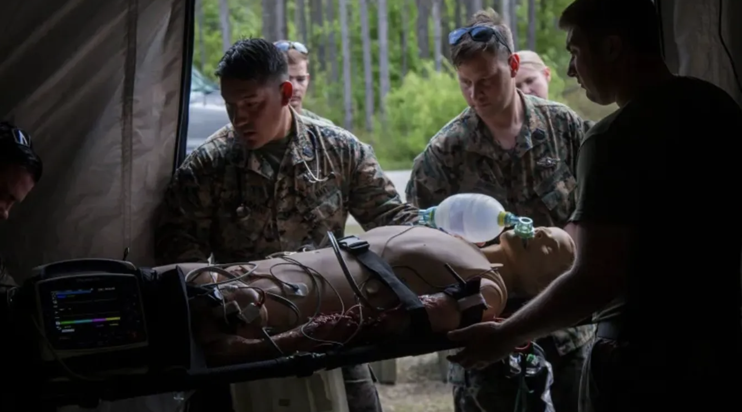 Military service members carrying out a drill