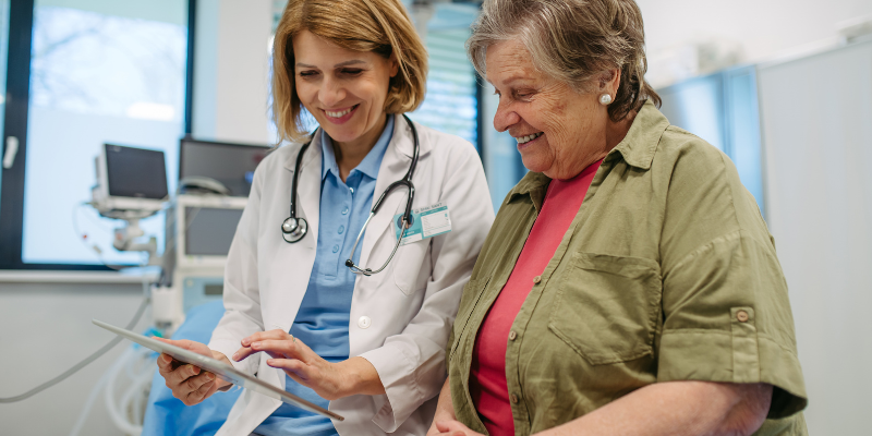 Dr. sitting with patient