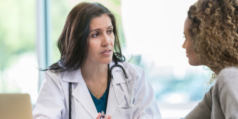 Dr. talking to a patient