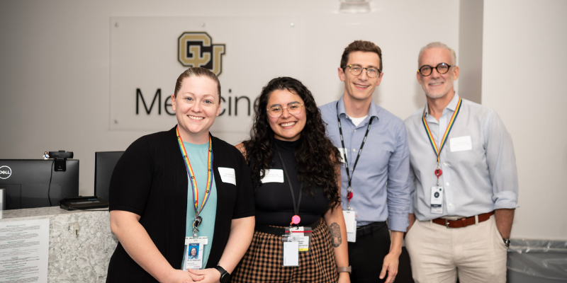 Group photo of Centerfield's providers in front of check-in desk area.