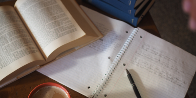 Close up of notes and a book.