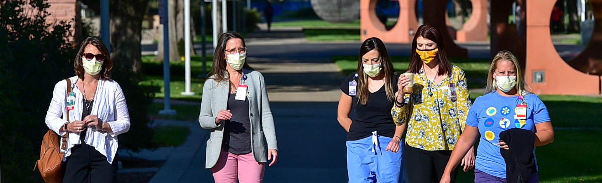 People on the street wearing face masks