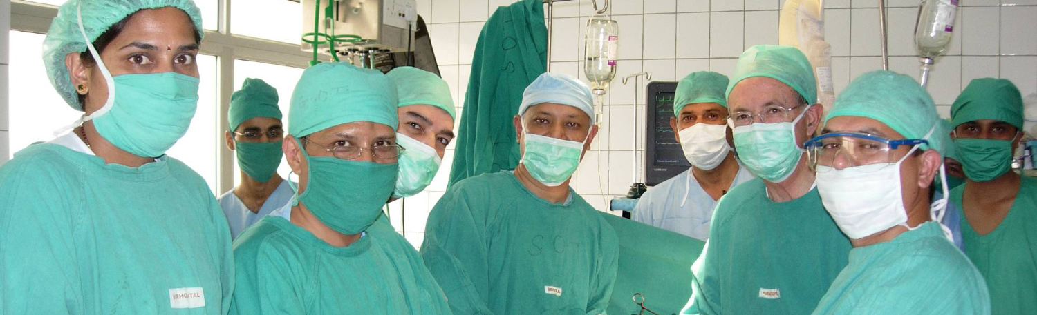 Frederick Grover, MD, with colleagues in Nepal operating room