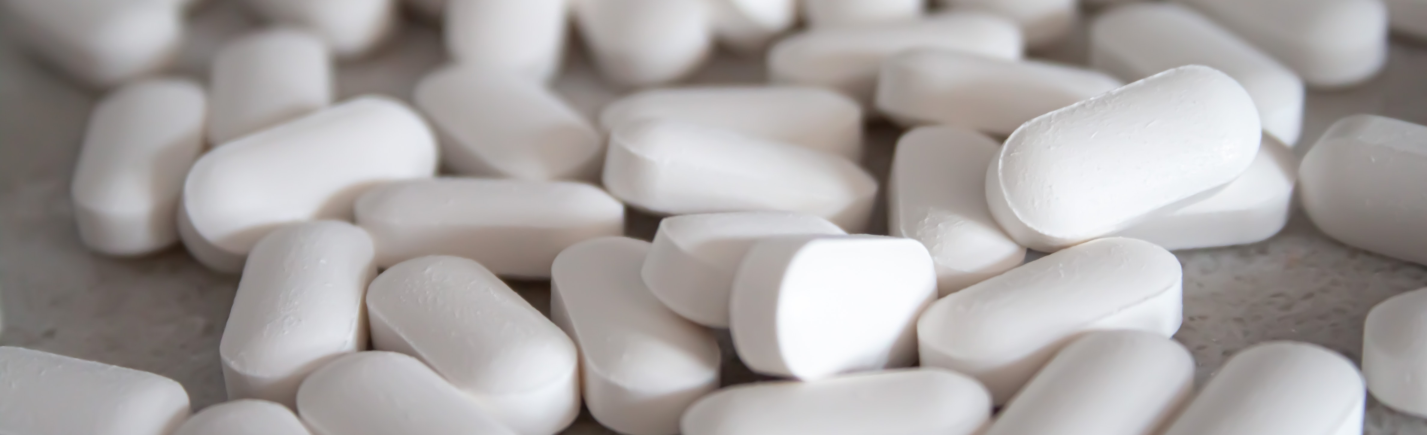 Scatter of White Pills | CU Department of Surgery | Matthew Iorio, MD