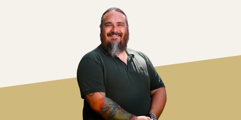 Peter DeWitt, PhD, with a gold and white angled background