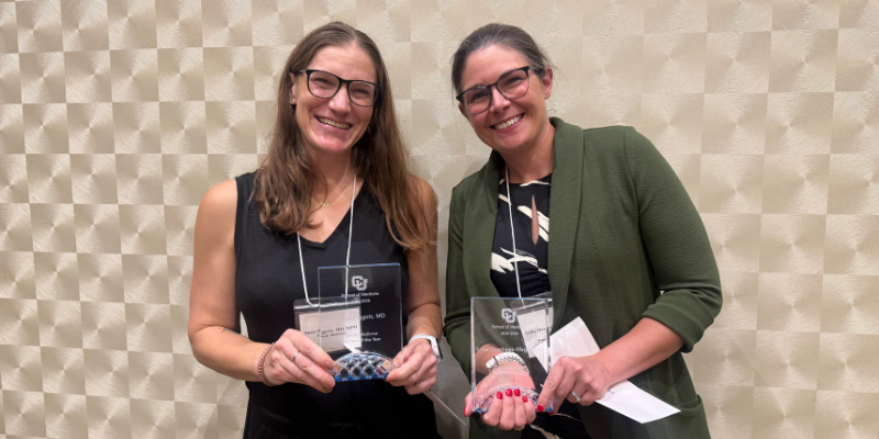A group photo of LIC Teacher award winners holding up their awards.