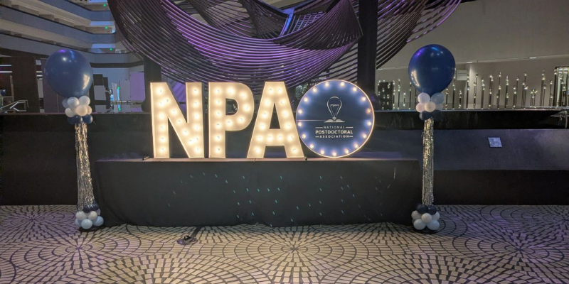 National Postdoc Association sign at entrance of event in San Francisco, CA