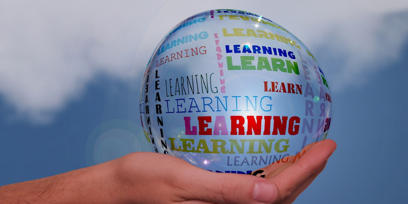 Hand holding a bubble that says 