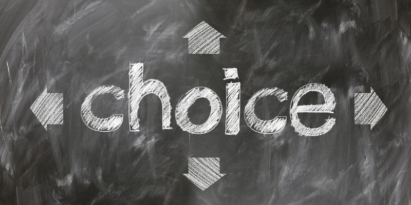 "Choice" written on a chalkboard with arrows going in all directions