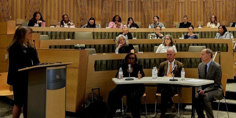 Photo of moderator and panelists in the Fulginiti Pavilion Gossard Forum