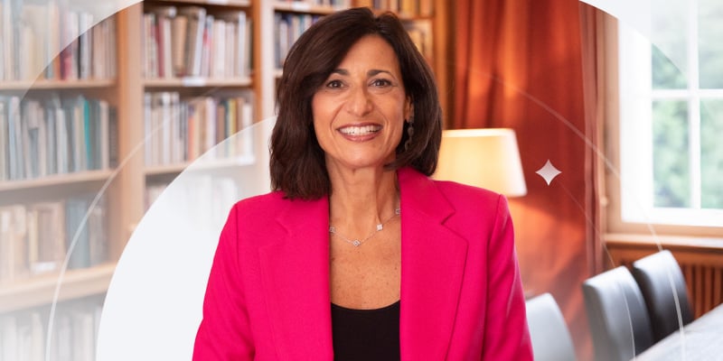 Dr. Rochelle Walensky smiles with bookshelf and office in background overlayed by white geometric graphics