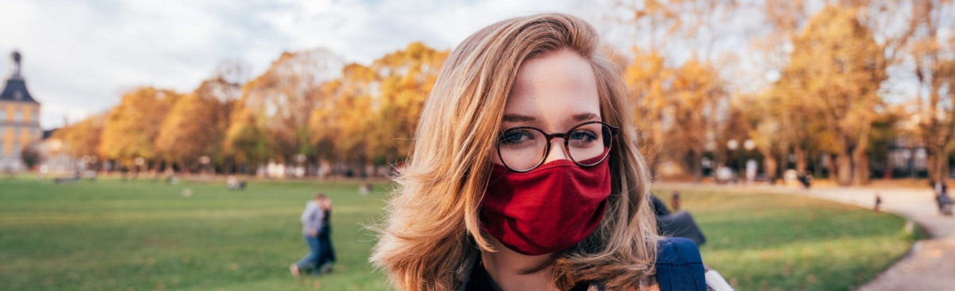 Woman smiling in face mask
