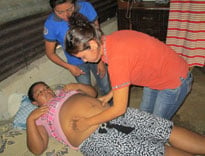 Marco Celada, MD treating Sandy Mendez of Guatemala
