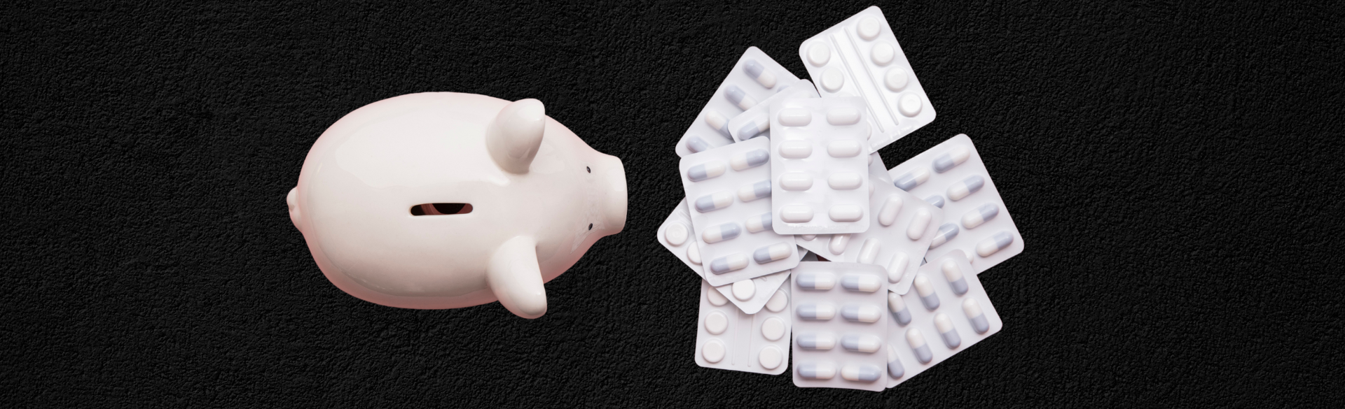 A piggy bank set on a black background with an image of prescription medication. 