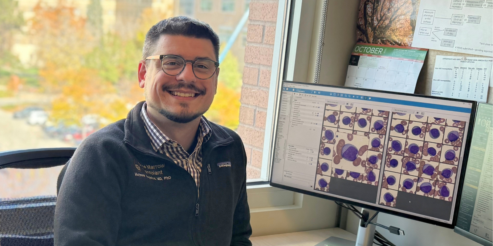 Mathew Angelos, MD, PhD in his office | University of Colorado Cancer Center