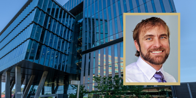 Matt DeCamp headshot in front of the University of Colorado Anschutz Health Sciences buildling