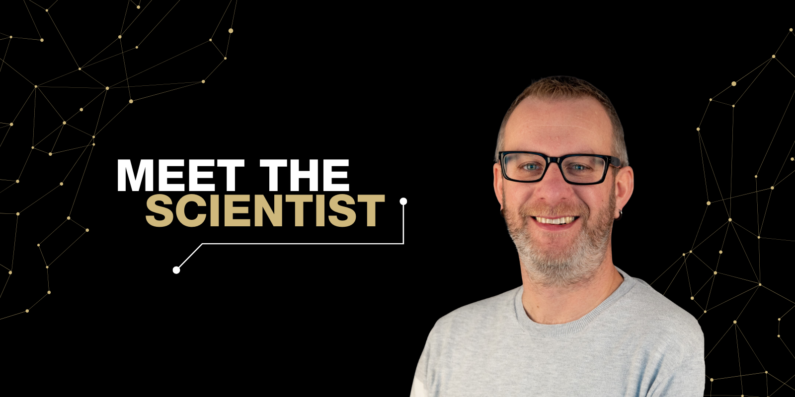 Breck Duerkop, PhD, on a stylized Meet the Scientist backdrop