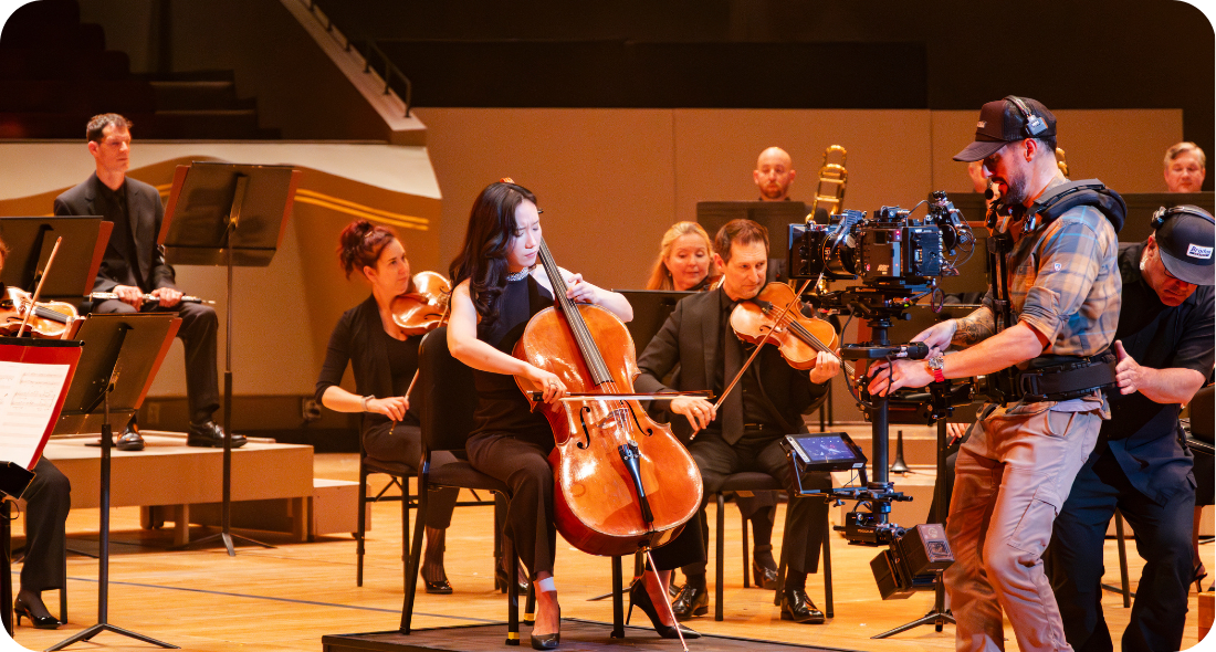 Principal Cello Seoyoen Min being filmed for Never Dream Alone campaign