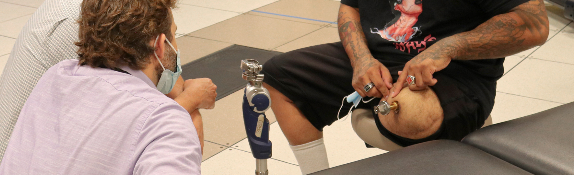 An osseointegration patient sits in the clinic