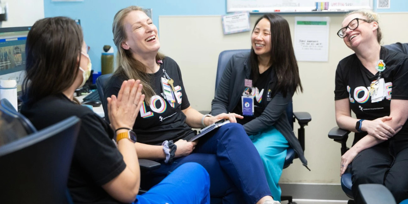 Photo of CTRC nurses sitting together and laughing