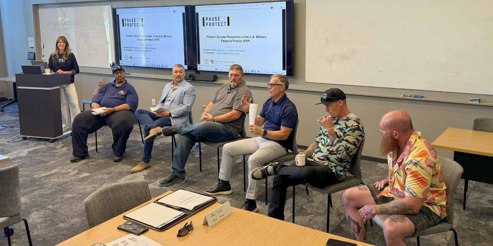 Firearms business operators speak at the Pause to Protect forum on firearm suicide prevention in the U.S. military on June 18, 2026, at CU Anschutz. At left is Jacquelyn Clark, CU Emergency Medicine research services senior professional.
