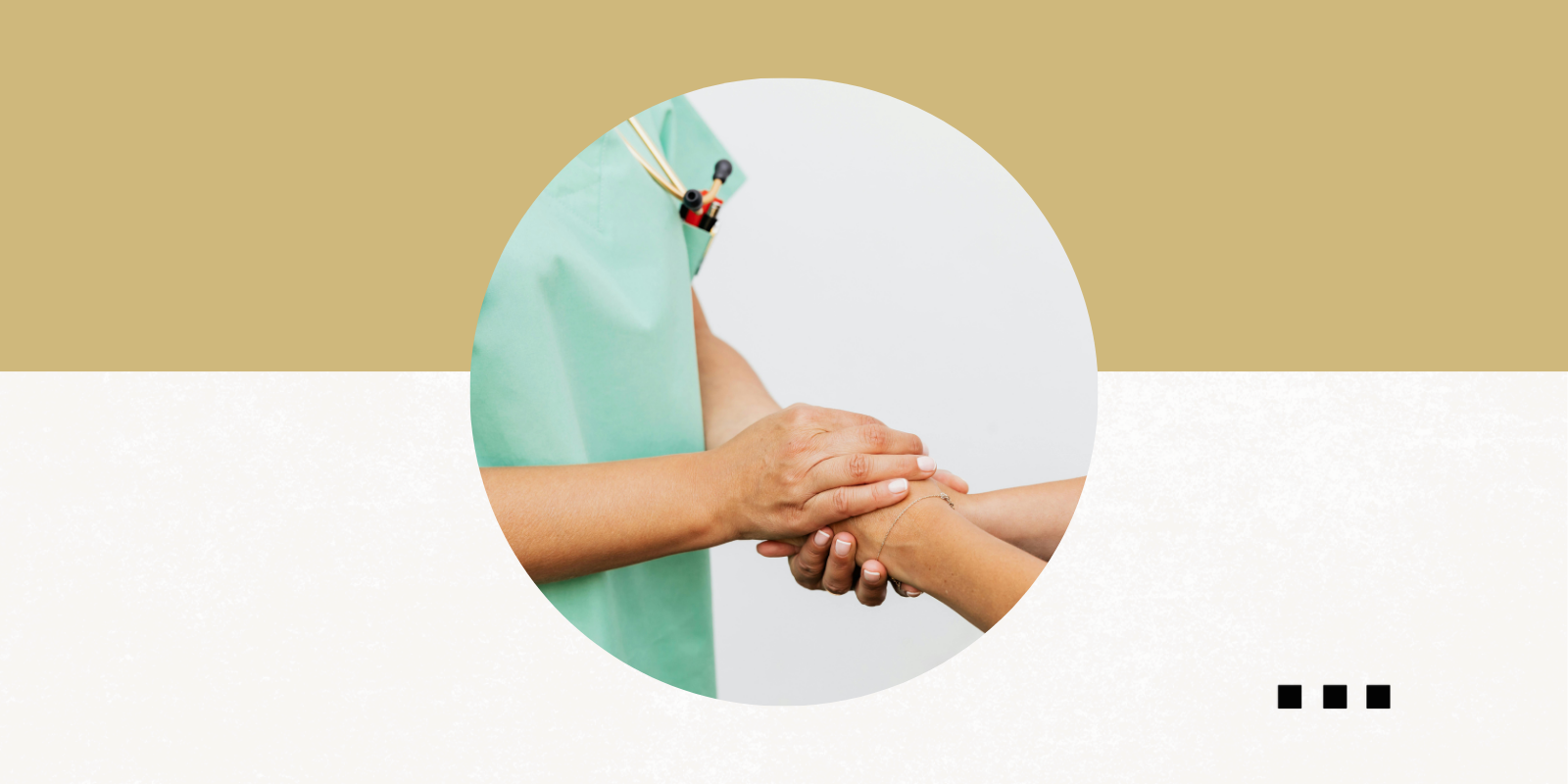 person wearing scrubs and a stethoscope holding the hands of another person