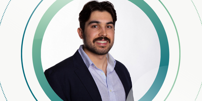 Eduardo Romo headshot enveloped in teal and white shapes