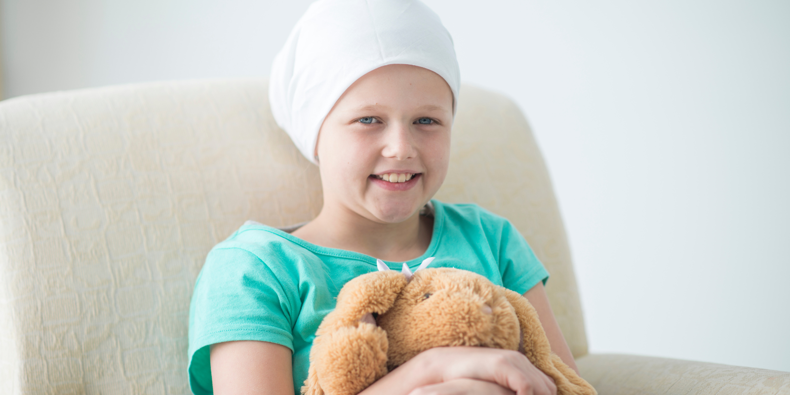 young girl in hospital bed