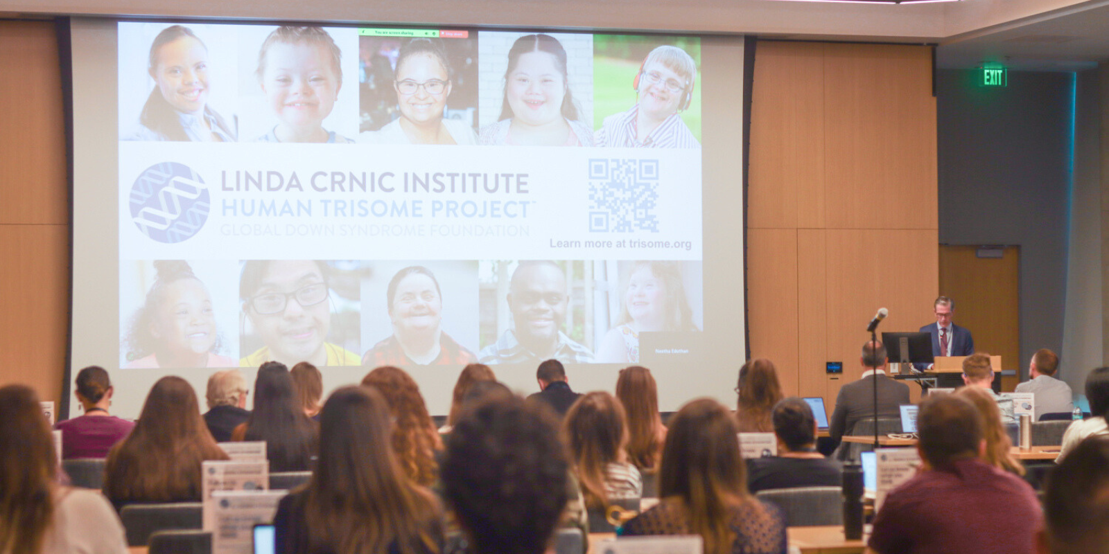 Dr. John Sampson presenting to the Crnic Institute Down Syndrome Research Symposium attendees