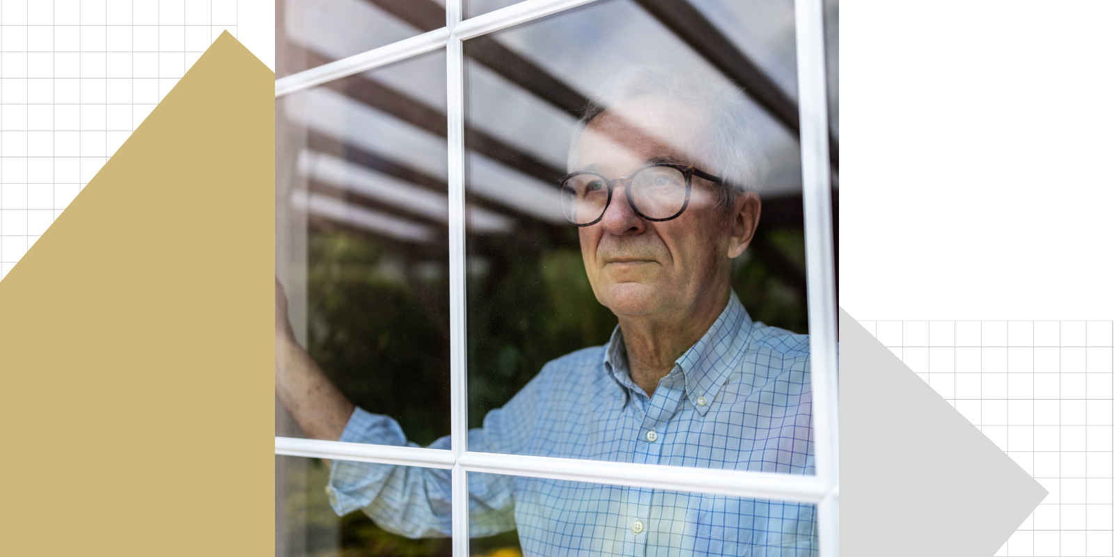 sad man looking out window