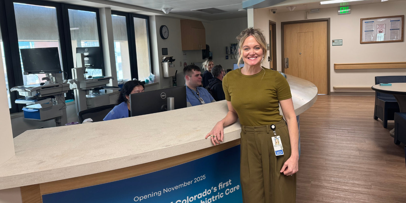 Bobbie Jo Dodson, DO, poses for a photo at a desk in the IMAP unit.