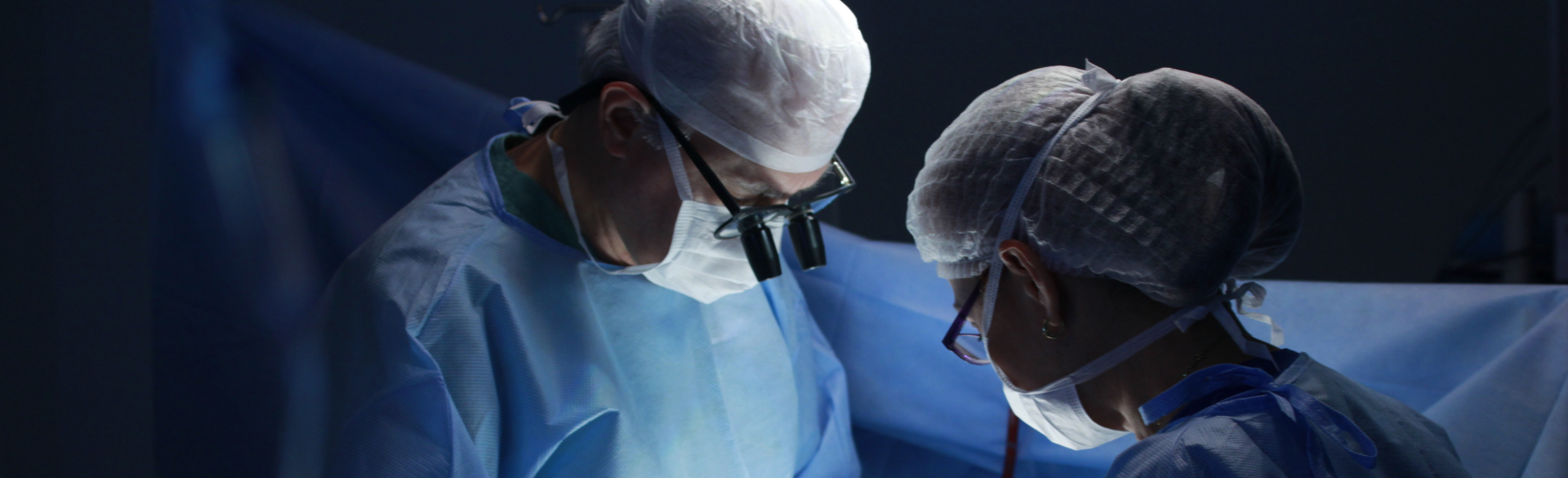 Two surgeons operating | University of Colorado Department of Surgery