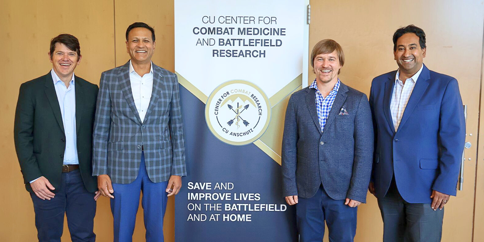 Ukrainian medical researcher Roman Fishchuk, MD, MSc (second from right) during a visit to the CU Center for Combat Medicine and Battlefield Research in November 2025. With Fishchuk are (from left) &nbsp;Corey Bills, MD; Vik Bebarta, MD; and Adit Ginde, MD, MPH of the CU Anschutz Department of Emergency Medicine.