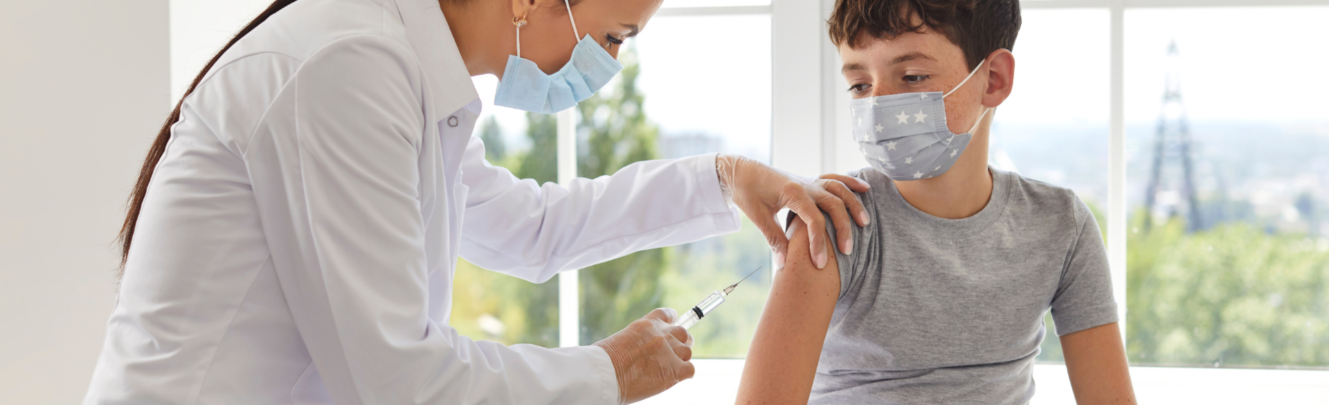 child receiving vaccine shot