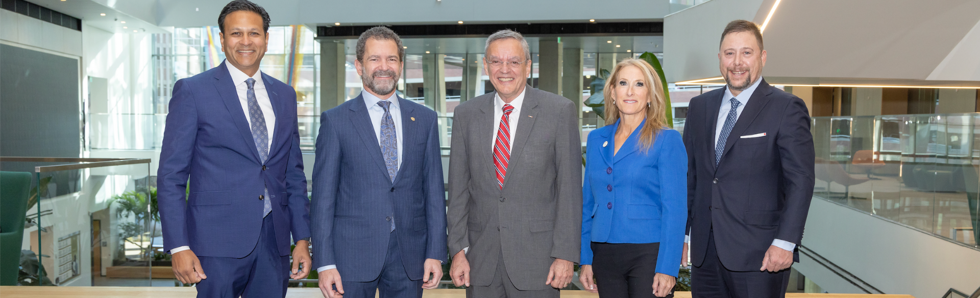 Leaders posing for photo; from left to right: Vik Bebarta, MD; Todd Saliman, CU President; Lester Martinez-Lopez, MD, MPH; Brig Gen Kathleen Flarity, DNP, PhD; Christian P. Anschutz, President of the Anschutz Foundation