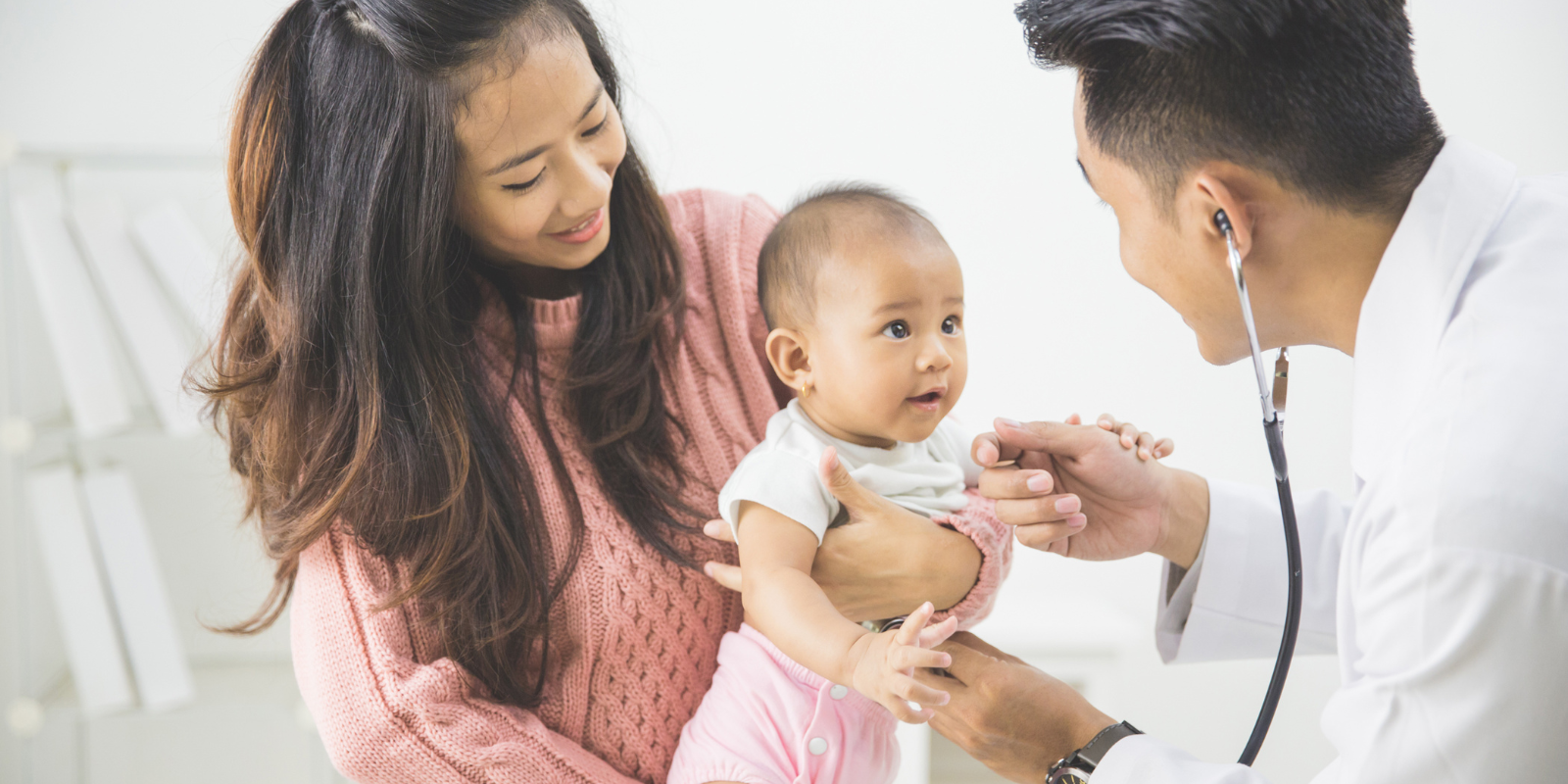 doctor and nurse with child