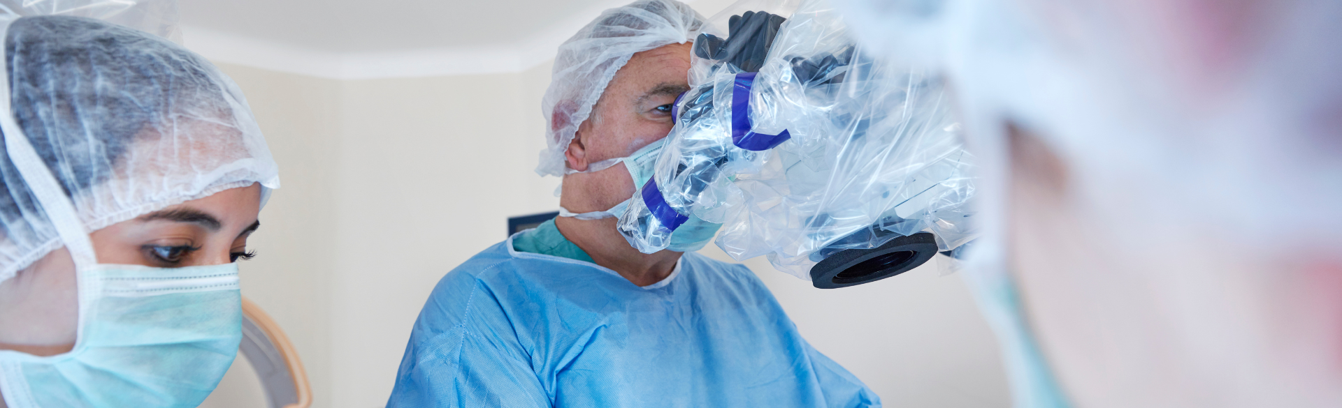 surgeon at the console of a surgery robot