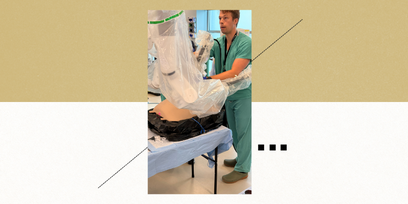Resident Jakob Durden, MD, trains on a surgical robot.